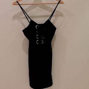 Elegant Black Dress with Eyelet Detail